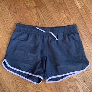 Columbia charcoal shorts with purple trim medium